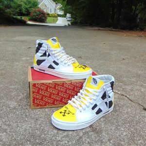 black yellow and white vans
